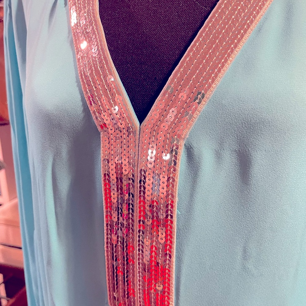 NWOT. Sheer blouse with rhinestone embellishment